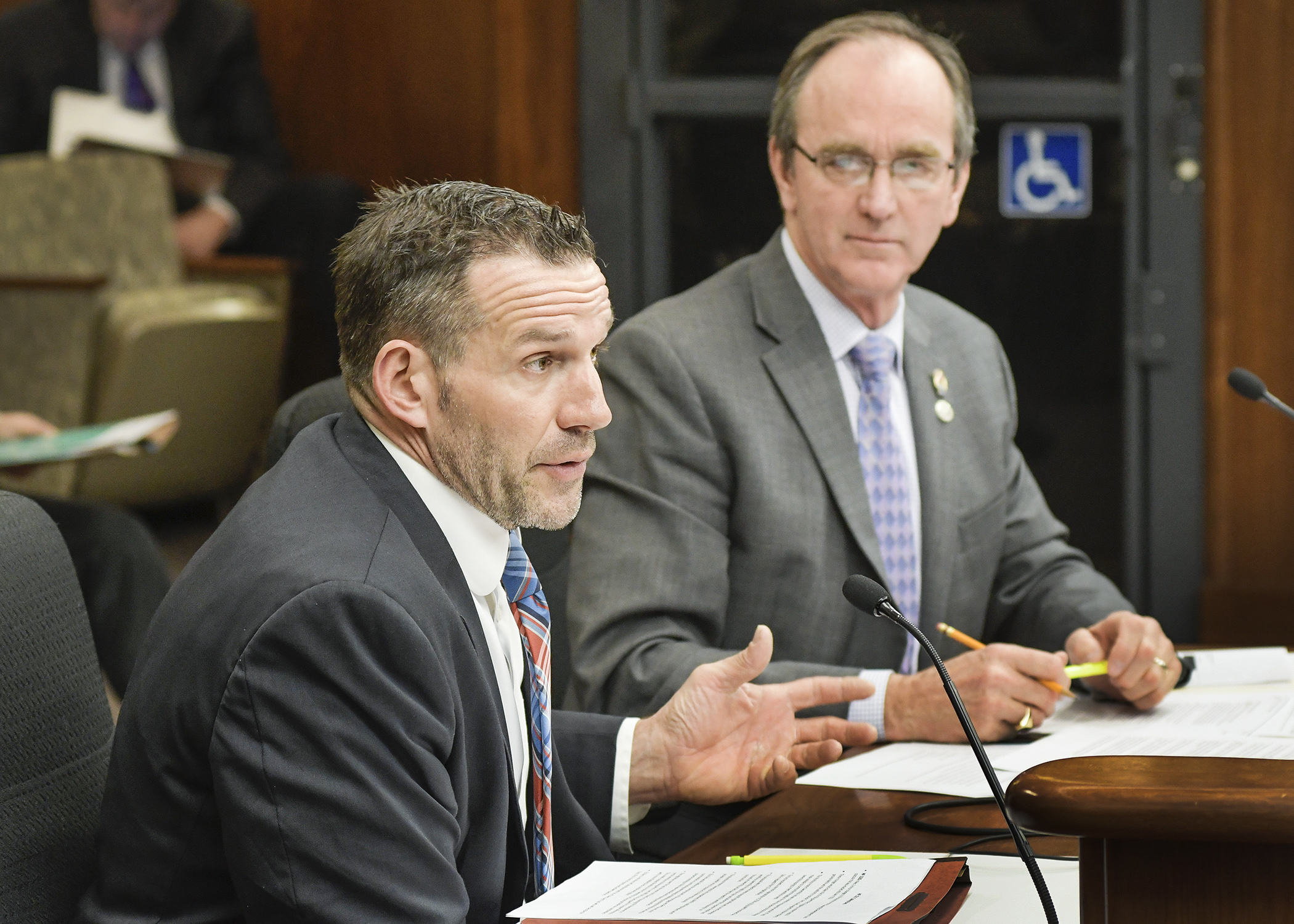 City of Lakes Land Trust Executive Director Jeff Washburne, left, testifies before the House Job Growth and Energy Affordability Policy and Finance Committee March 6. Photo by Andrew VonBank